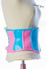 Load image into Gallery viewer, Bubblegum coloured corset on a mannequin with 'Basque Glory' branding.