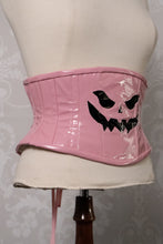 Load image into Gallery viewer, Side view of pink PVC corset