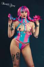 Load image into Gallery viewer, Person wearing a colorful outfit with pink and blue accents against a dark background.
